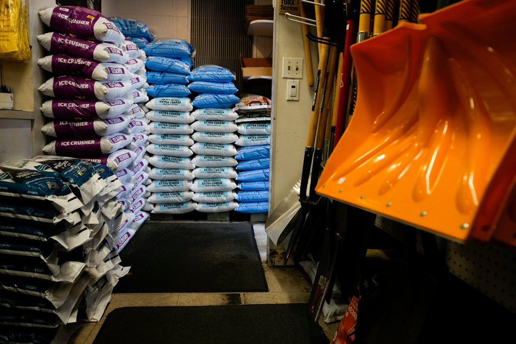 Salt and shovels are displayed for sale at Ankeny Hardware in Portland, Ore.