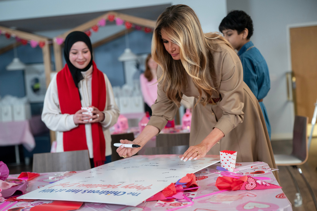 First lady Melania Trump signs a Valentine