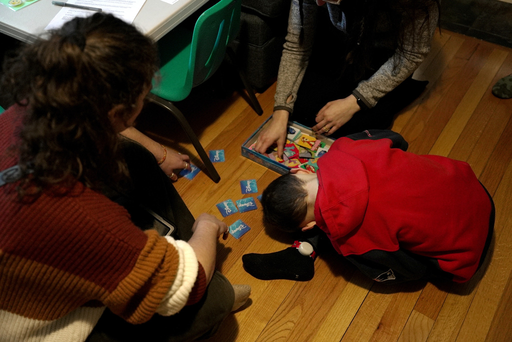 Connor Murphy takes a break from a matching problem during an applied behavior analysis after school in his home