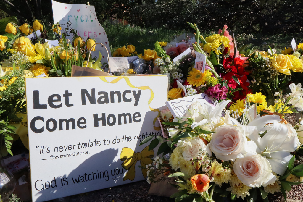 A memorial grows outside the home of Nancy Guthrie, the missing mother of "Today" show host Savannah Guthrie
