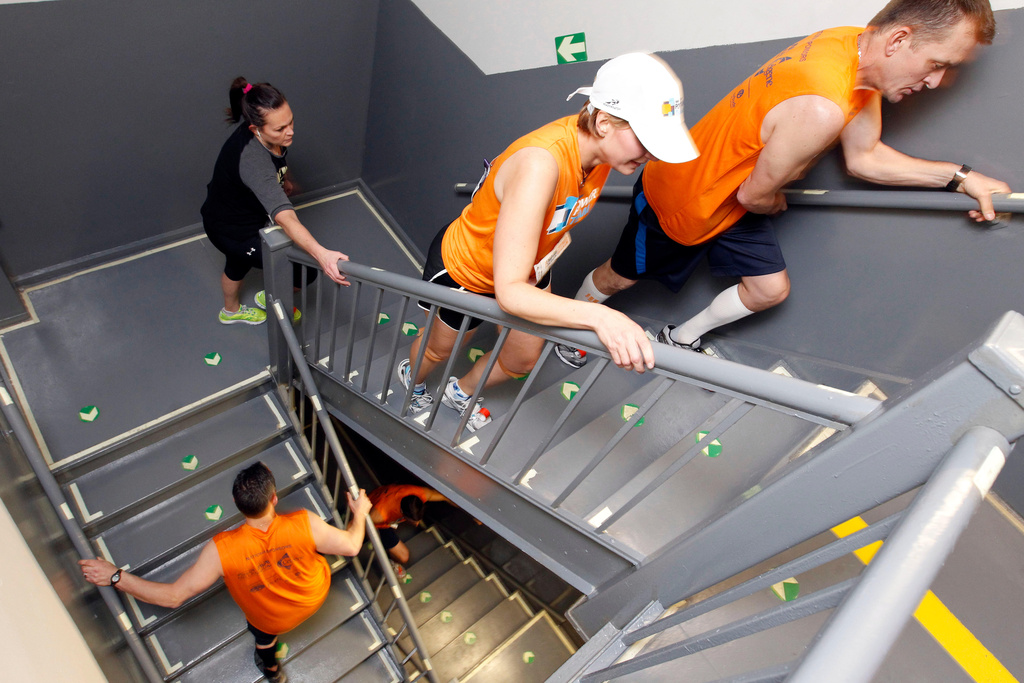 Exercising Stair Climbers Are Determined, Even When Security Guards Are Alarmed 