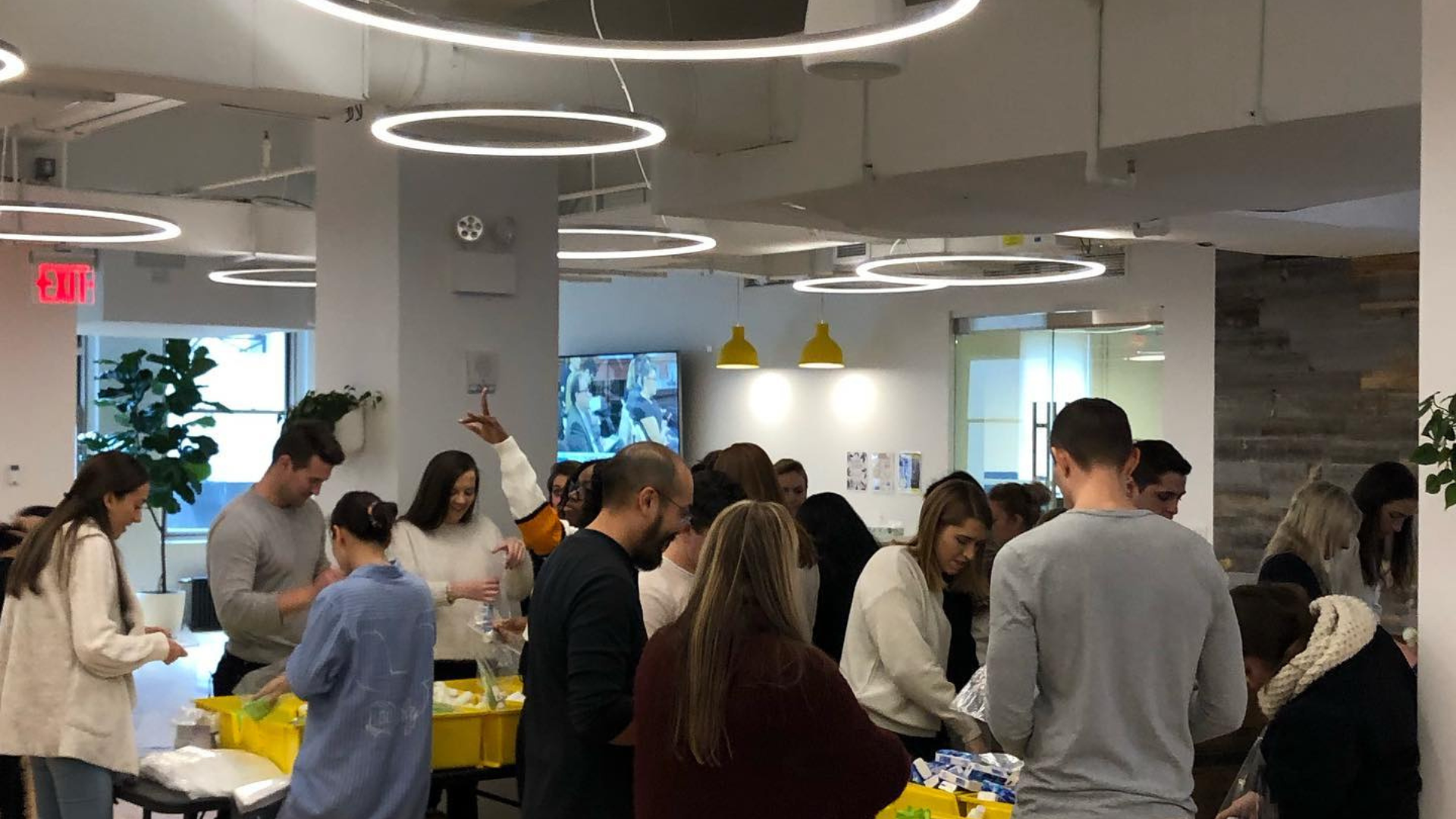 Corporate partners often join Shower Power NYC to help pack hygiene kits.