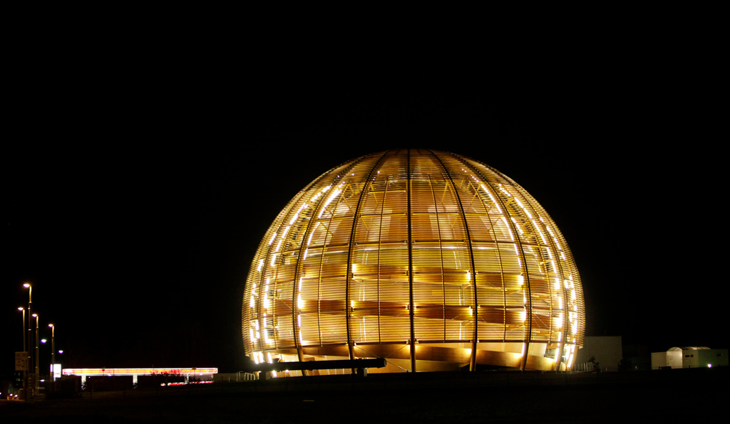 he globe of the European Organization for Nuclear Research, CERN, is illuminated outside Geneva, Switzerland
