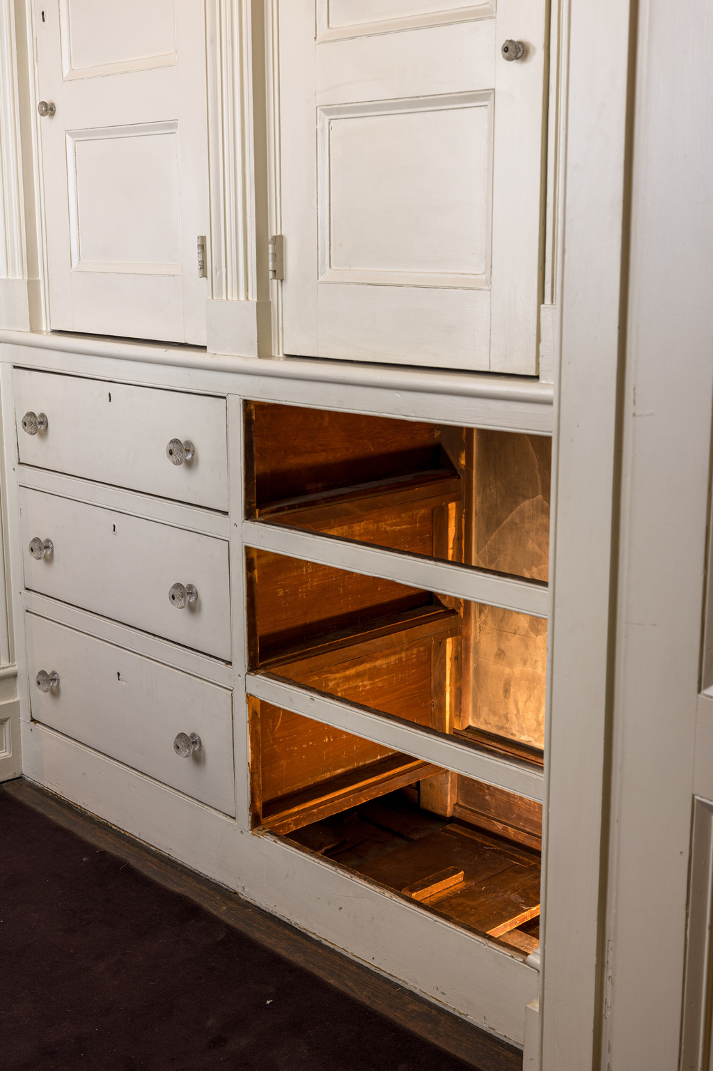 A passageway, believed to have been used as part of the Underground Railroad, is hidden in the base of a dresser inside the Merchant’s House Museum