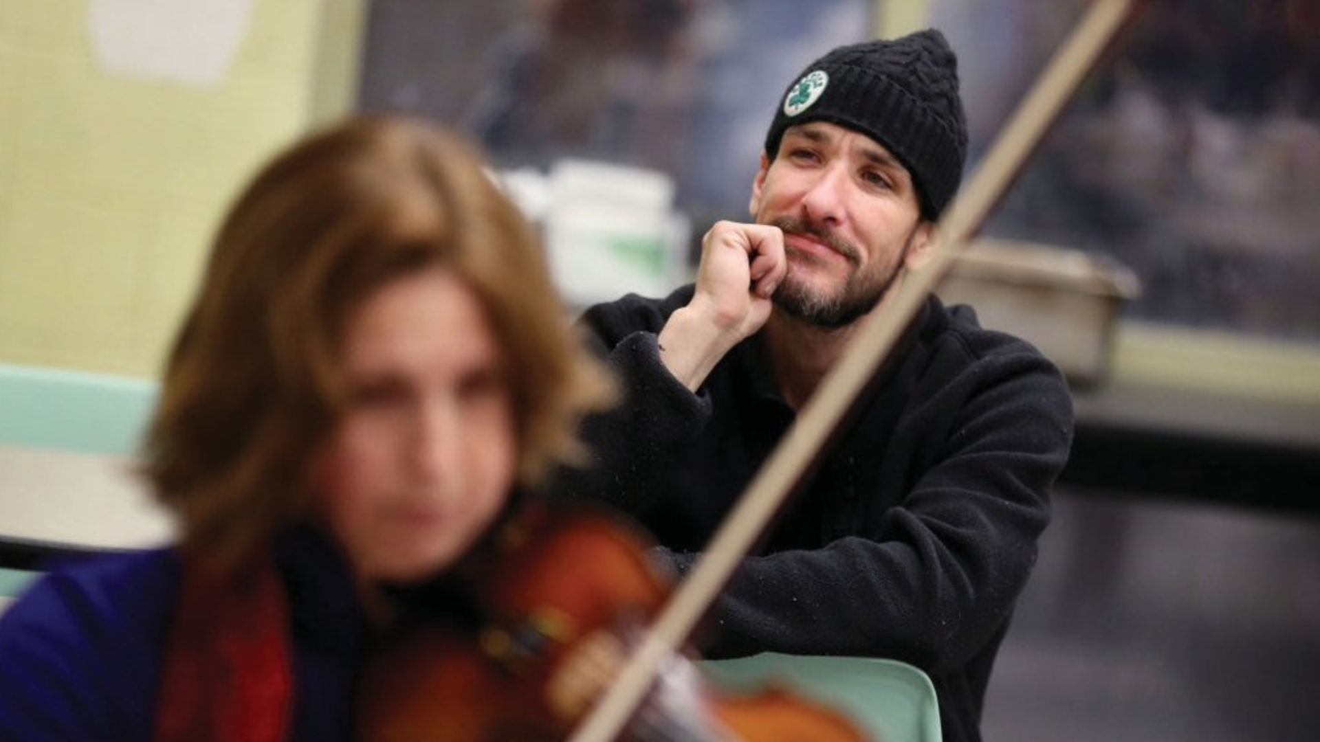 An audience member takes in a Shelter Music Boston concert.
