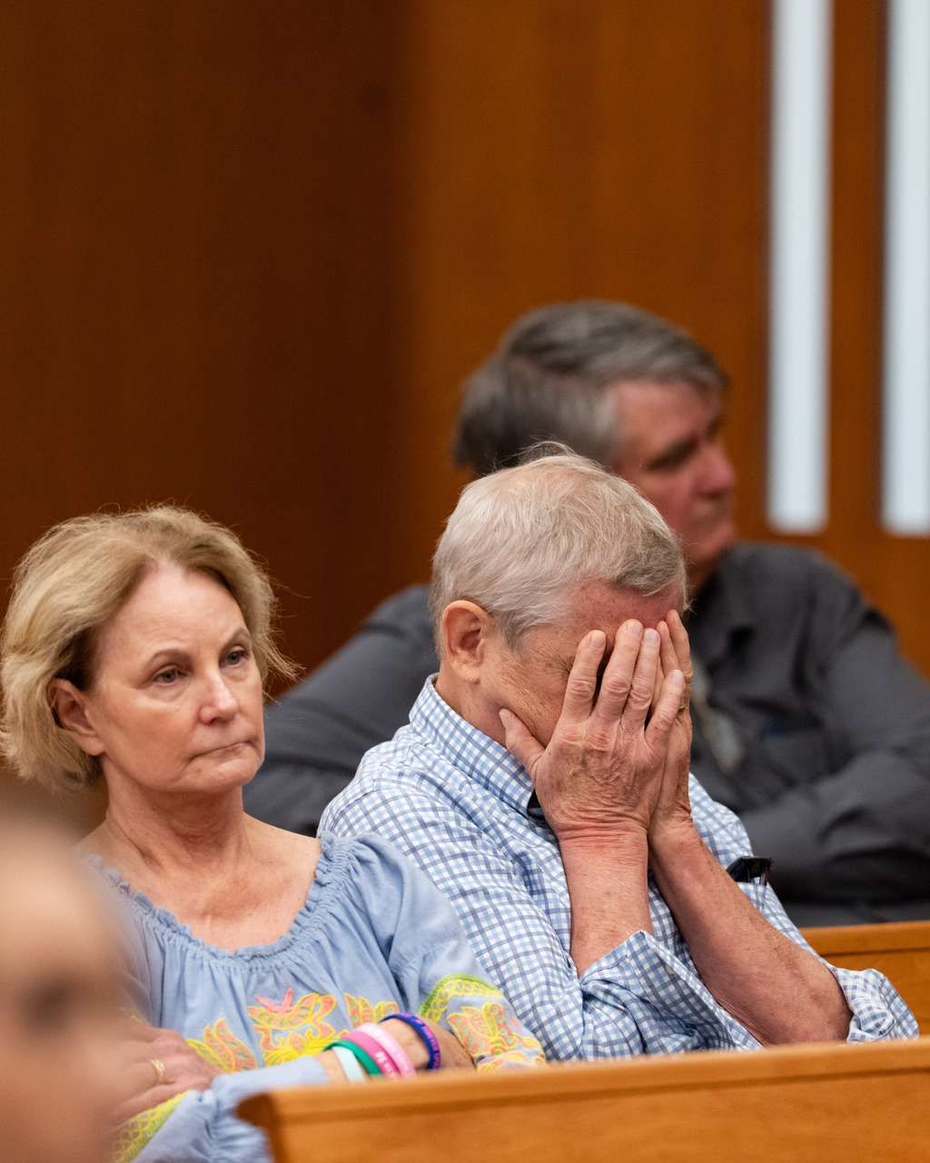 Members of the gallery listen to testimony during a hearing on a suit against Camp Mystic in the 459th State District Court in Austin