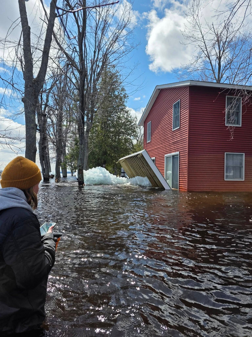 Chunks of ice and flooding in Michigan’s Black Lake 
