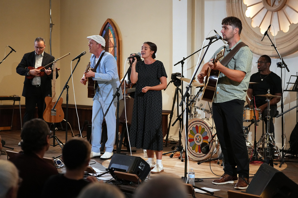 Conrad Fisher, Rose Stoltzfus and Ben Stoltzfus perform at Ragamuffin Hall in McCoysville, Pa.