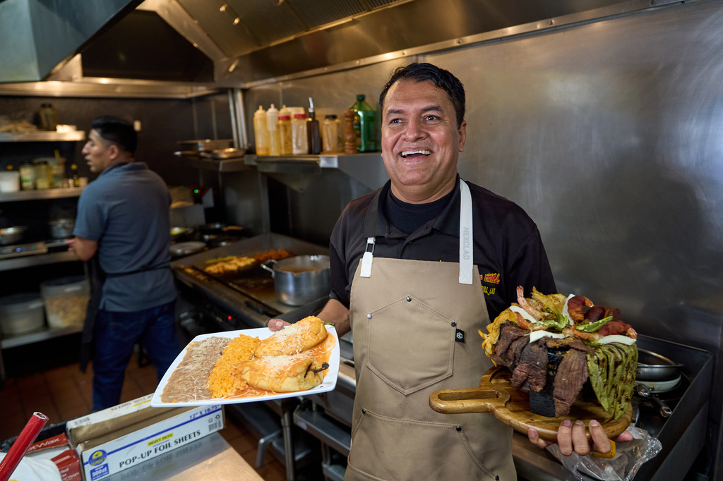 Mexican restaurant owner-chef Marco Mendoza prepares a hot molcajete, a traditional Mexican dish, at Cuernavaca