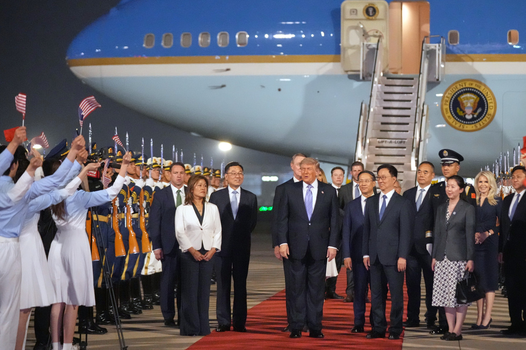 President Trump Arrives In China For Pivotal Meetings With Xi In Beijing