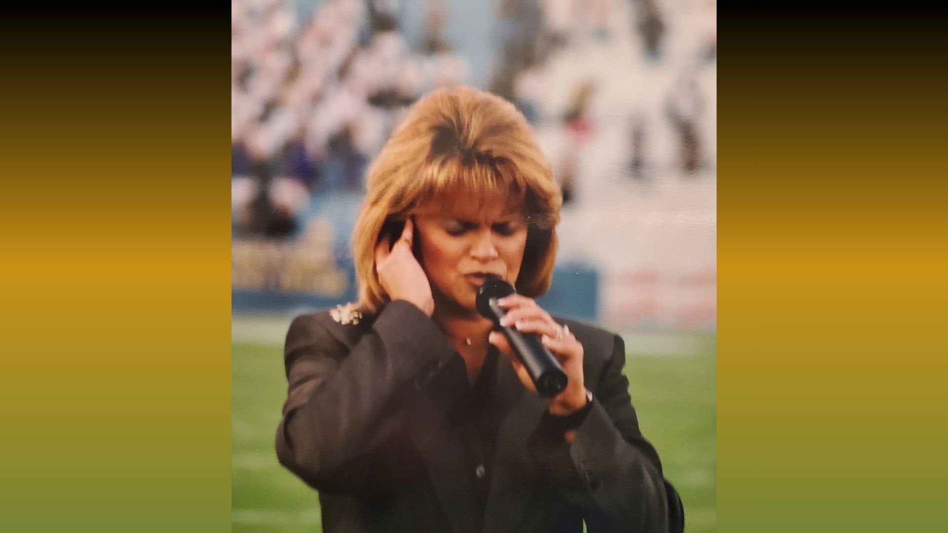 Crystal Thornton sings the National Anthem at Cotton Bowl Stadium in Dallas, Texas, during her years as a Texas television news anchor.
