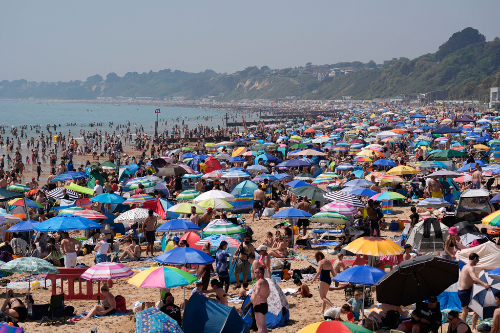 People visit Bournemouth beach, south England