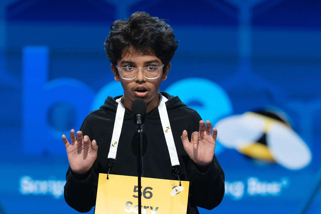 Sarv Dharavane, 12, Dunwoody, Ga., spells his word during the quarterfinals of the Scripps National Spelling Bee at DAR Constitution Hall