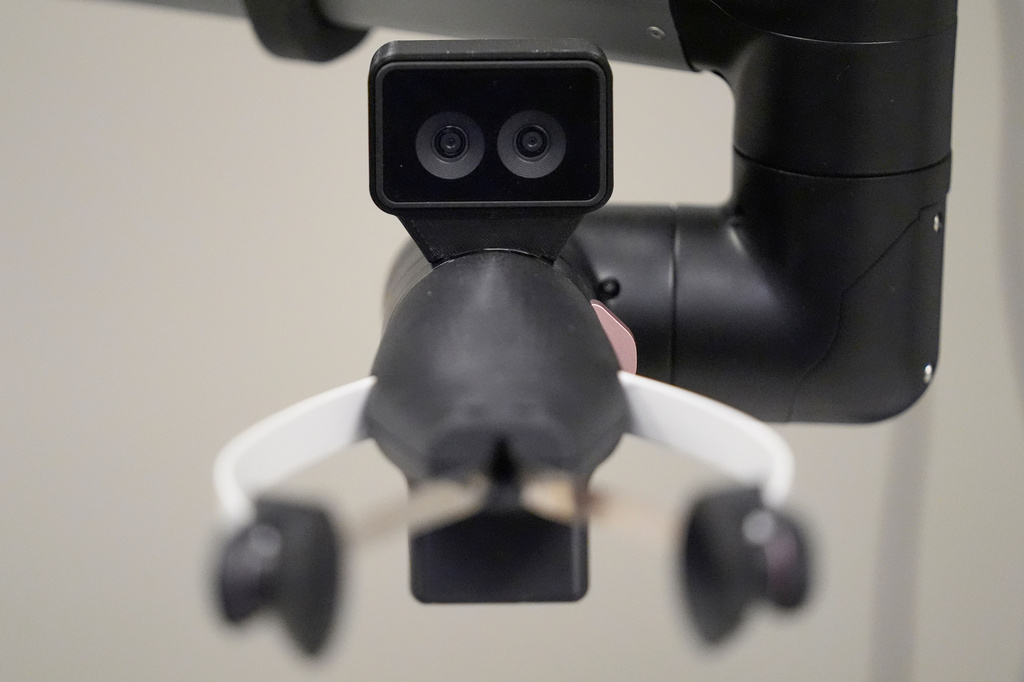 A camera on the hand of a Hello Robot uses two lenses for improved depth perception, during a demonstration at the University of New Hampshire