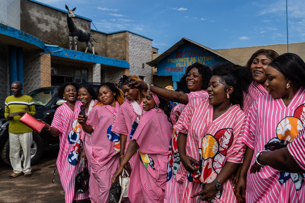 Wedding guests cheer at a wedding ceremony amid an Ebola outbreak in Ituri Province in Bunia, Congo