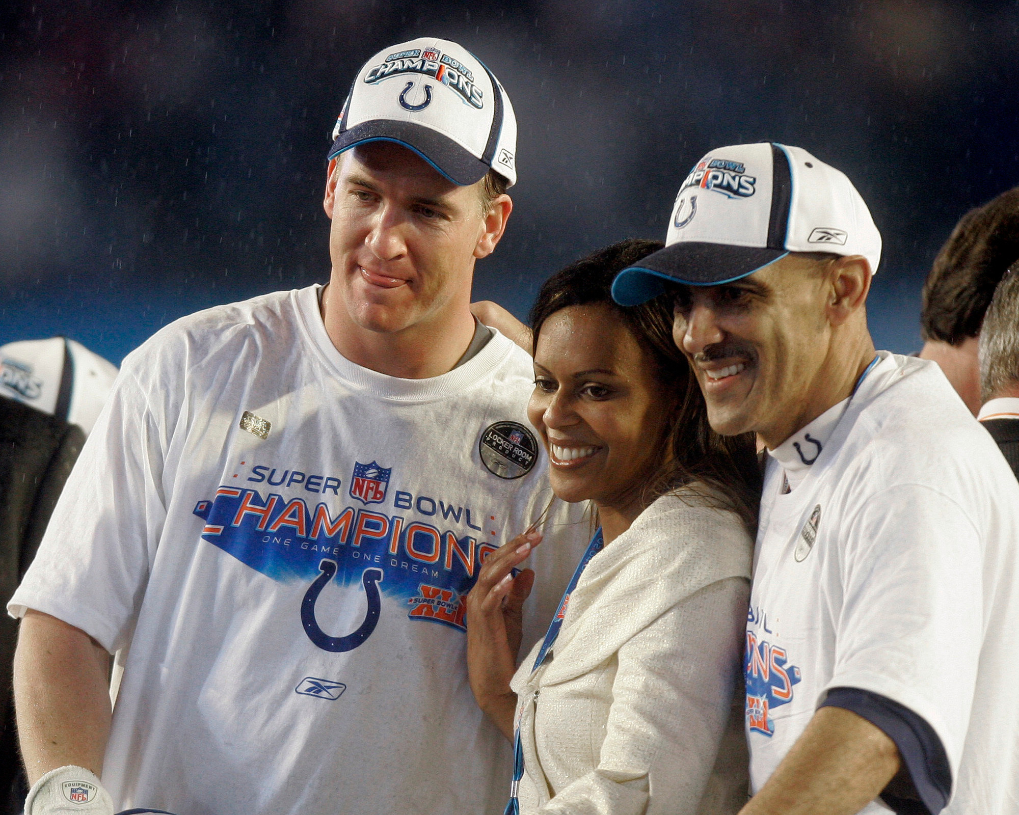 Peyton Manning (left), Lauren Dungy (middle), and Tony Dungy (right) celebrating a Super Bowl victory
