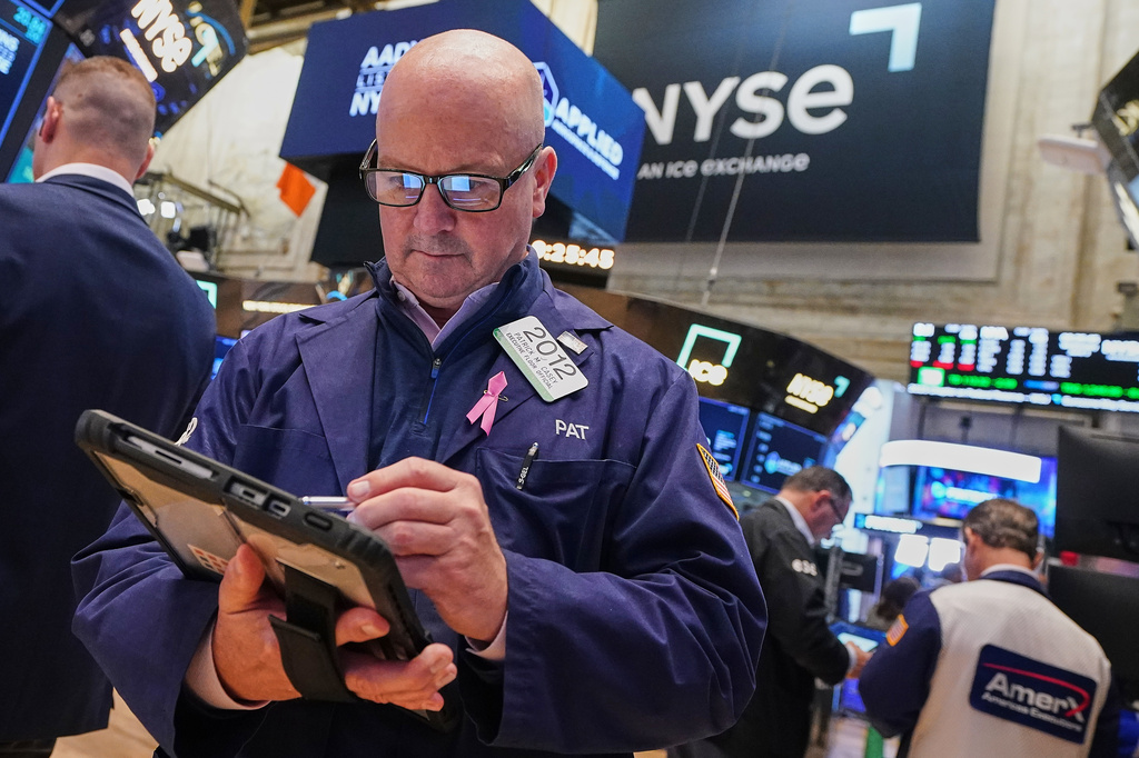 Trader Patrick Casey works on the floor of the New York Stock Exchange