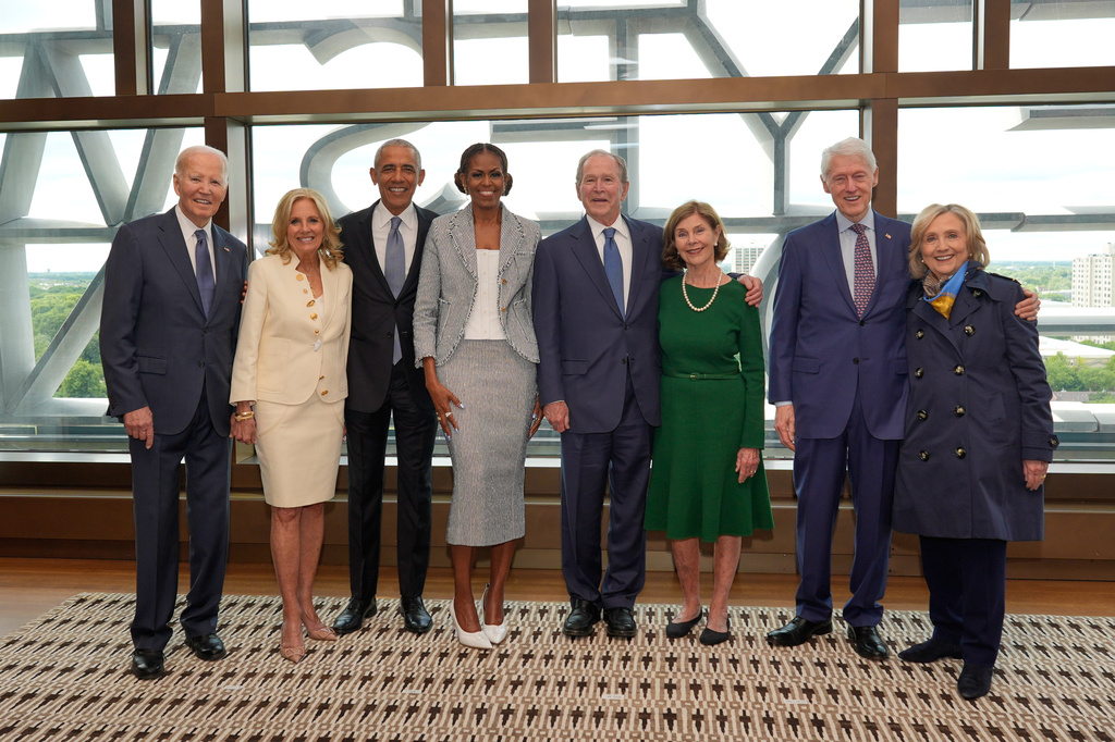 Former President Joe Biden and former first lady Jill Biden, from left, former President Barack Obama and former first lady Michelle Obama, former President George W. Bush and former first lady Laura Bush, and former President Bill Clinton and former Secretary of State Hillary Clinton, pose for a photo ahead of the dedication ceremony at the Obama Presidential Center