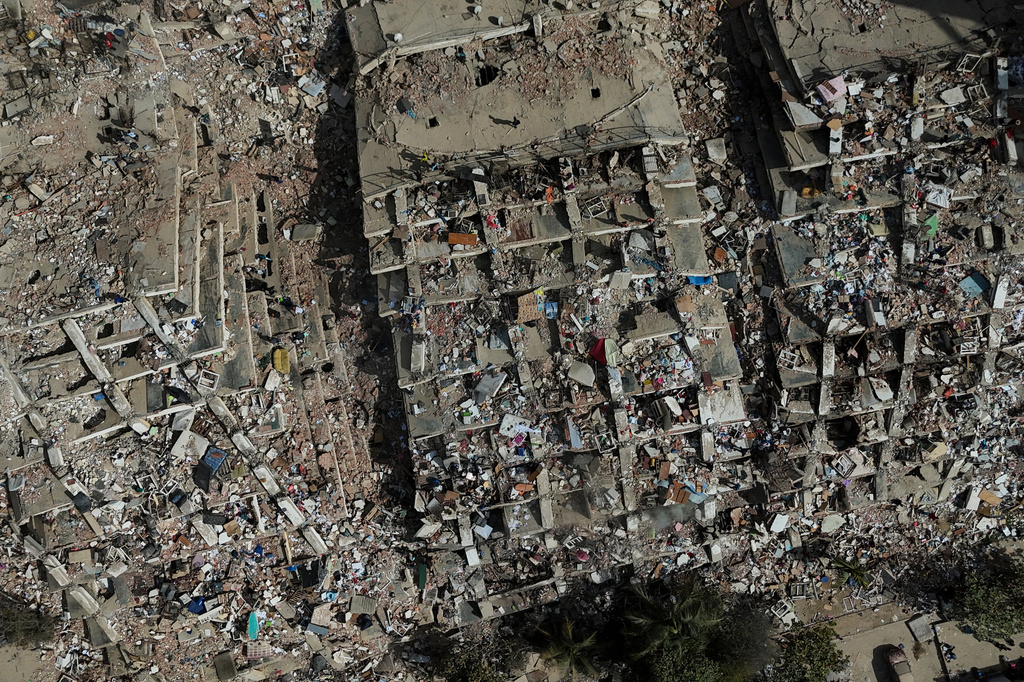 Damaged buildings are seen three days after earthquakes struck in La Guaira, Venezuela