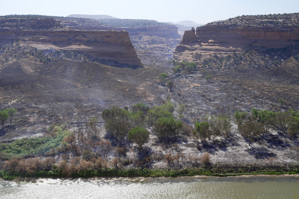 Burned section of the Snyder Fire seen from across the Colorado River in Mack, Colorado