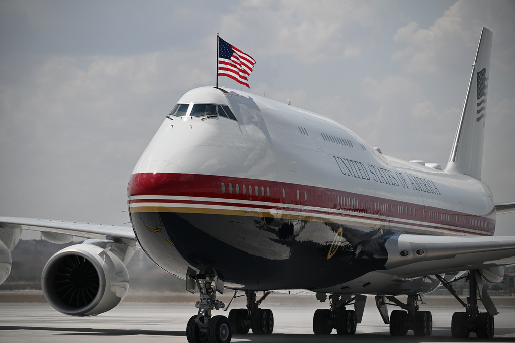 Air Force One carrying President Donald Trump arrives for the NATO summit