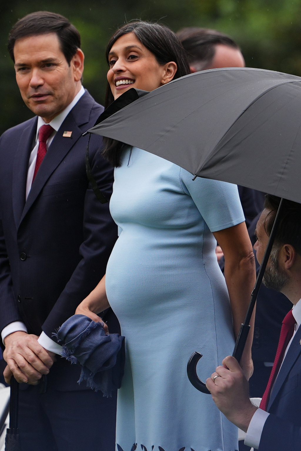 Second lady Usha Vance, center, stands with Secretary of State Marco Rubio, left, and Vice President JD Vance