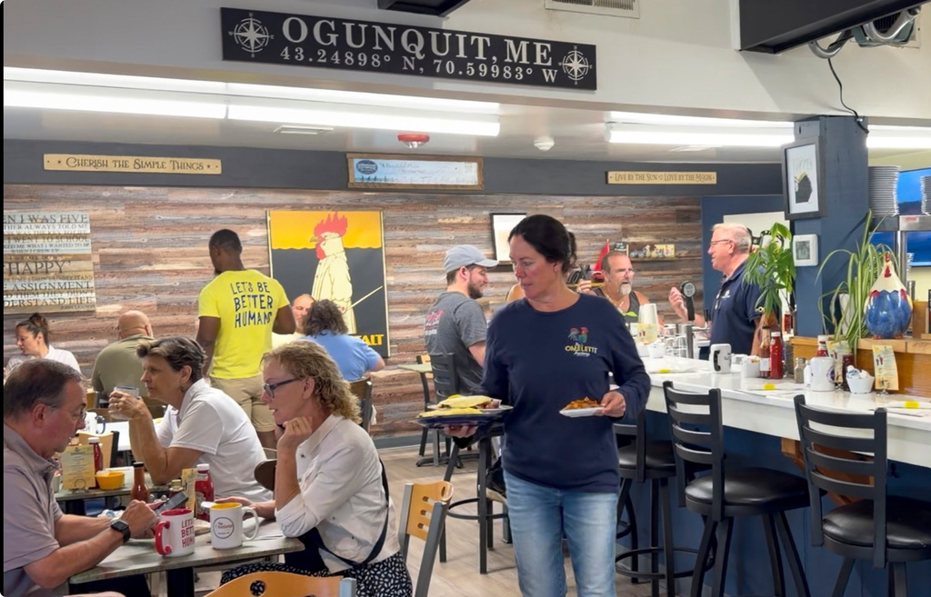 Breakfast is served at The Omelette Factory, a restaurant whose owners are in dispute with the town over large tin roosters, in Ogunquit, Maine