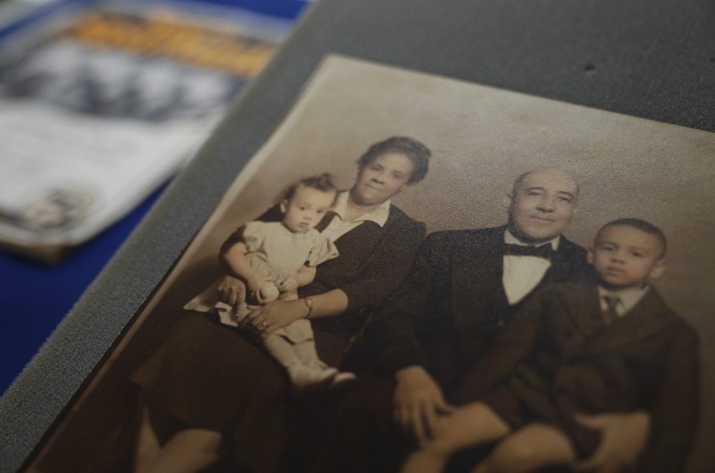 A family portrait of Frankie and Charles Pace with their children, Frances and Frank Jr., is displayed at the University of Pittsburgh