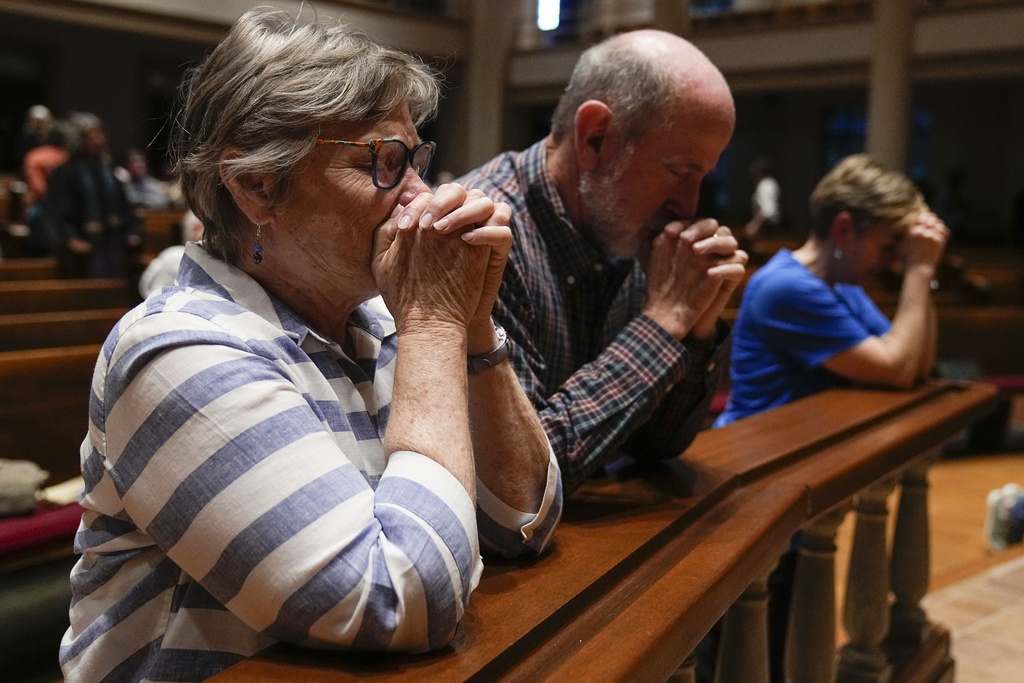 Pastor Paul Purdue participates in a community vigil at Belmont United Methodist Church in the aftermath of school shooting in Nashville, Monday, March 27, 2023