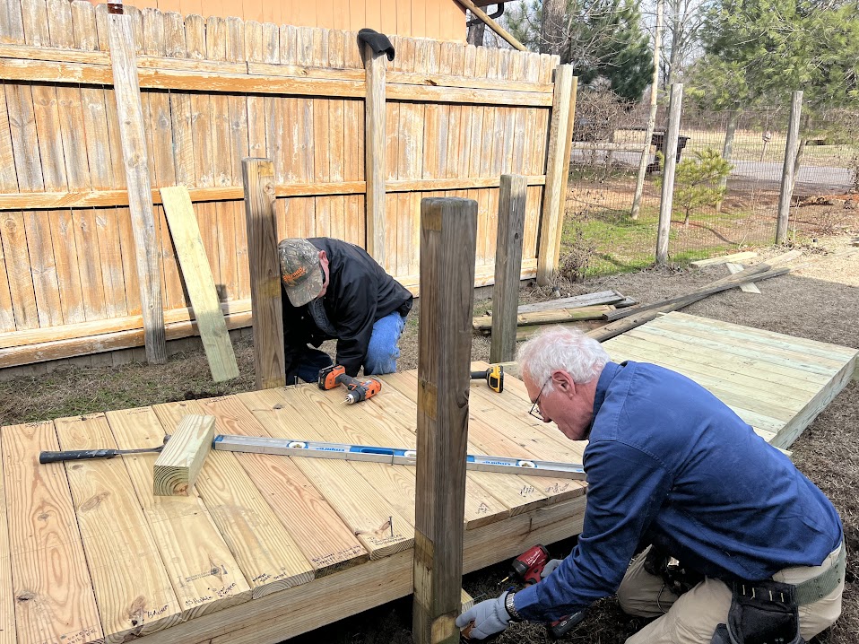 Two ramp ministry members building a ramp