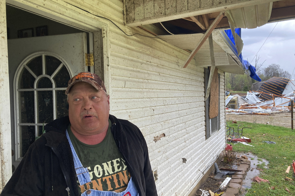 Keith Lincoln stands outside his damaged home in Glen Allen, Mo., on Wednesday, April 5, 2023.