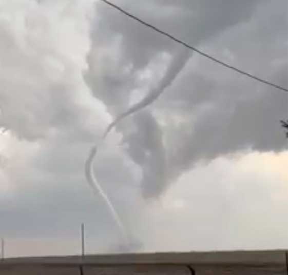 A tornado touches down in Pleasantville, Iowa.