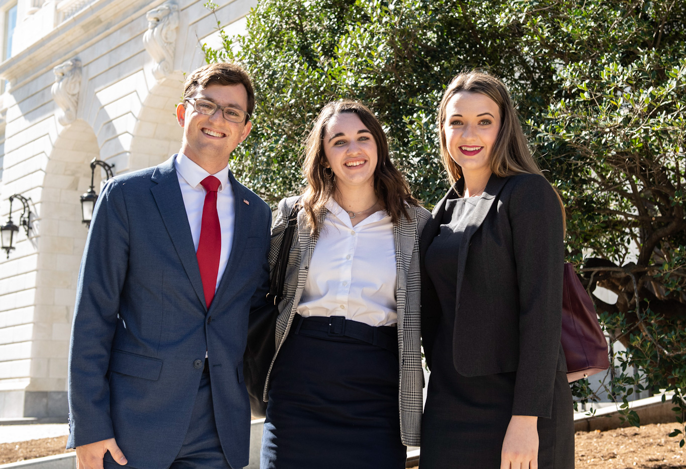 Dunham, center, poses with fellow political science students Jonny Gartner and Sage Showers during her semester in D.C.