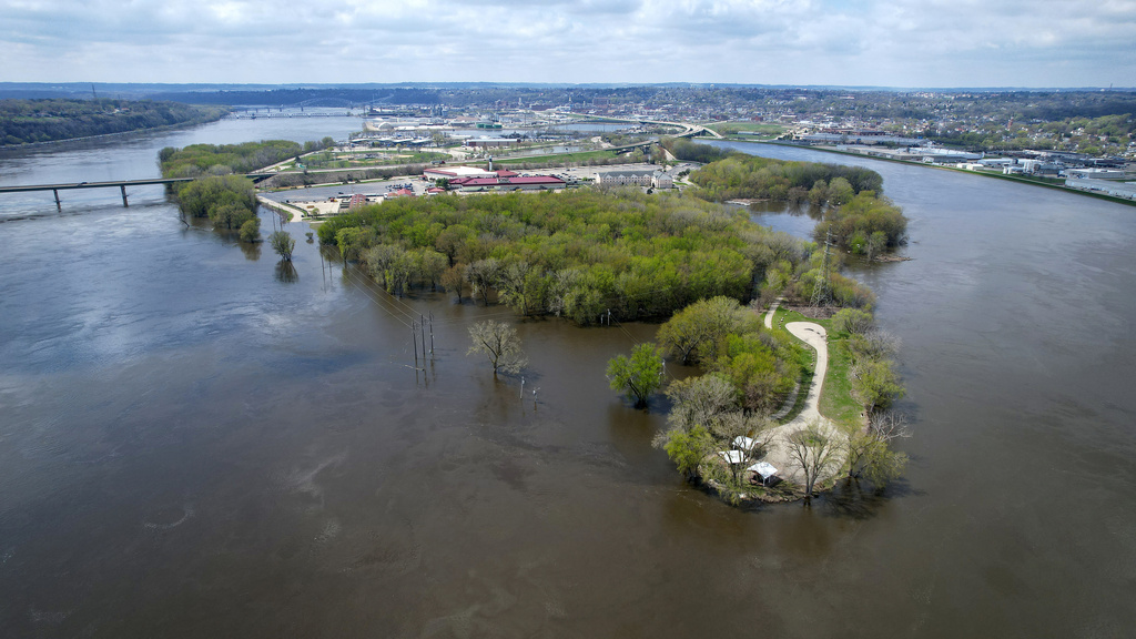 Mississippi River floodwaters cover Miller Riverview Park in Dubuque, Iowa