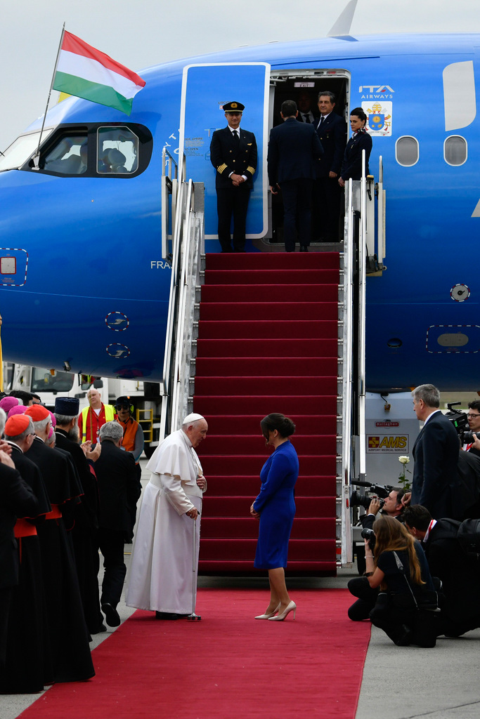 Pope Francis is greeted by Hungary President Katalin Novak during the farewell ceremony at the Budapest International Airport 