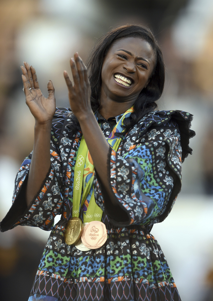 Former Southern Mississippi star and Olympic gold medalist Tori Bowie smiles during halftime of a college football game between Louisiana Tech and Southern Mississippi on Friday, Nov. 25, 2016