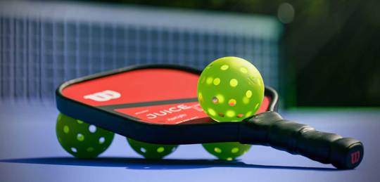 Pickleball racket and balls