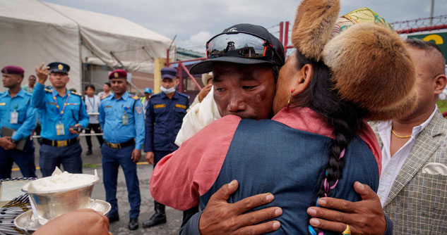 Man hugging his wife