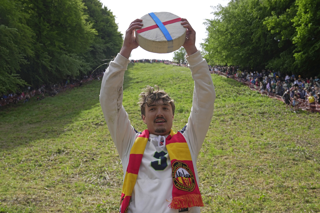 Cooper Cummings from the United States celebrates after winning a men