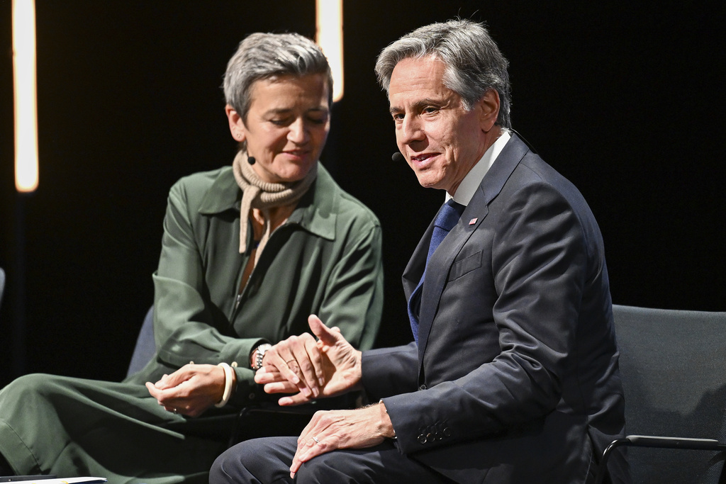 Margrethe Vestager, Executive Vice-President for A Europe Fit for the Digital Age and Competition, left, shakes hands with US Secretary of State Antony Blinke