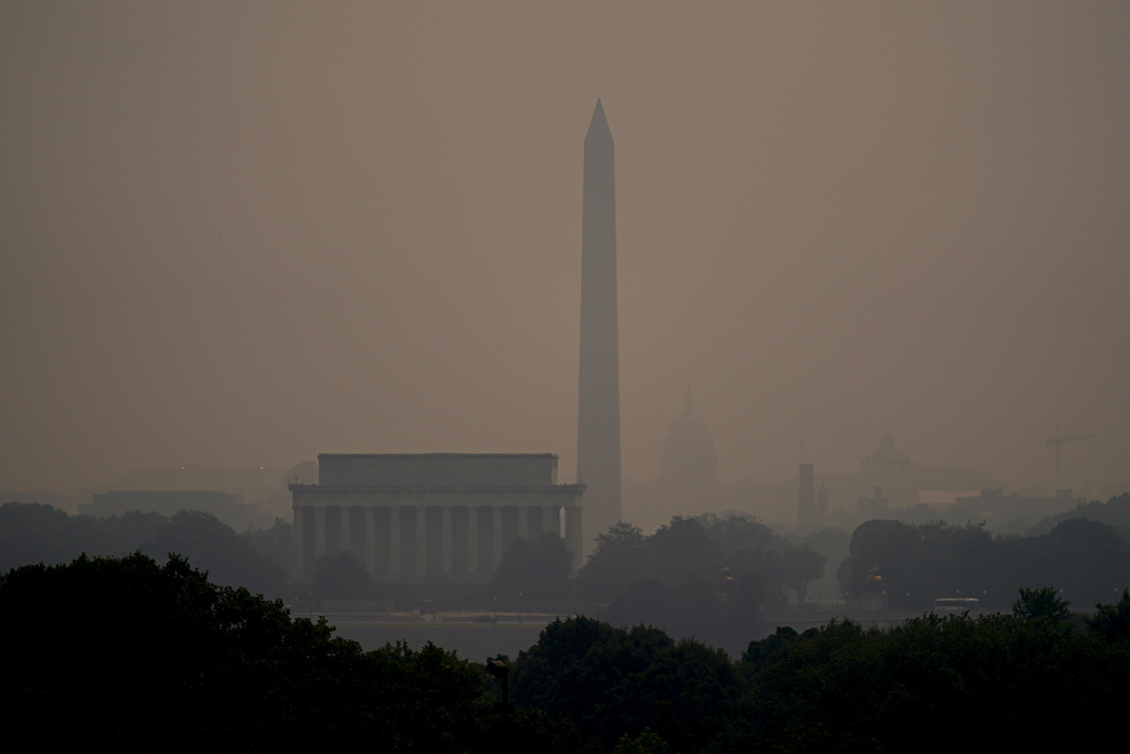 Haze blankets over monuments on the National Mall in Washington, Wednesday, June 7, 2023