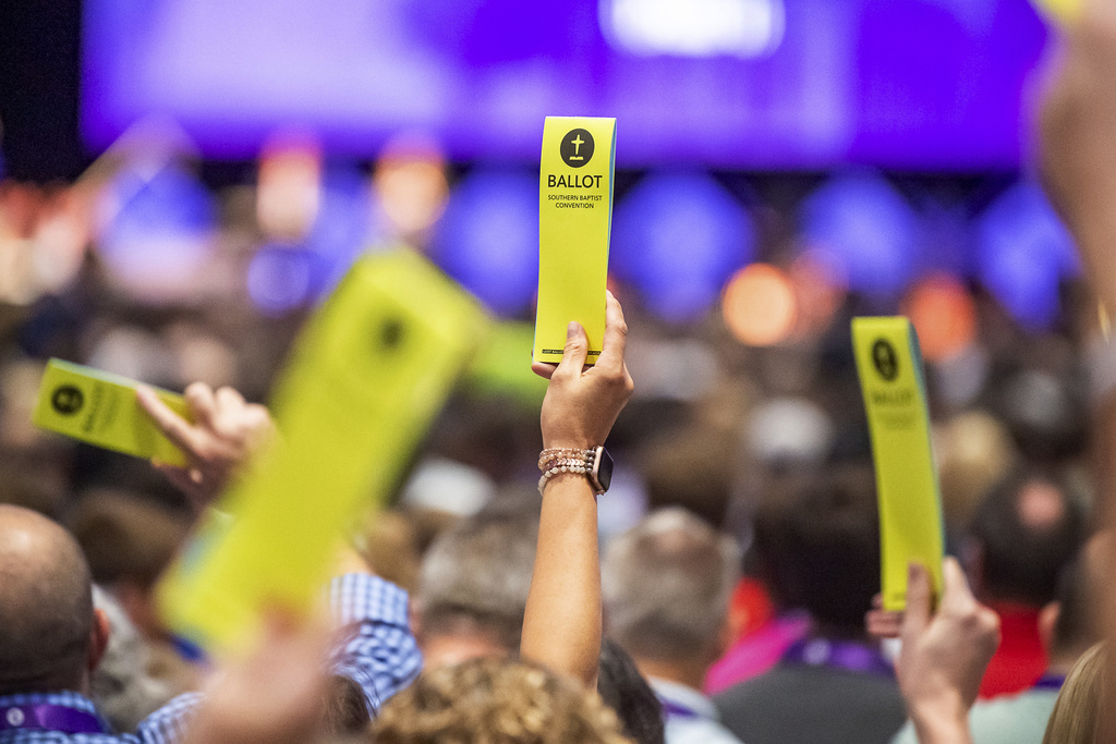 Delegates hold up their ballots at the Southern Baptist Convention at the New Orleans Ernest N. Morial Convention Center
