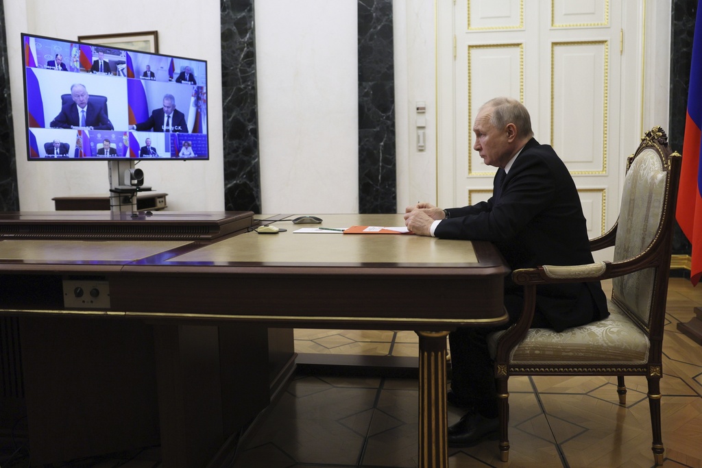 Russian President Vladimir Putin chairs a Security Council meeting via videoconference in Moscow
