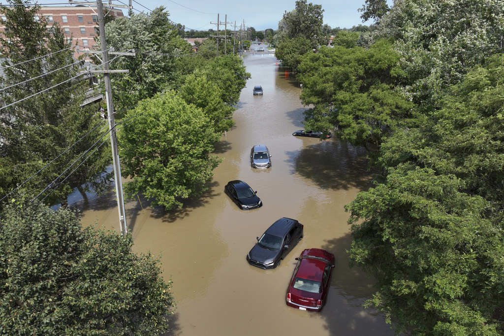 Dramatic Water Rescues, Lives Lost: Flooding Continues In Mich., Ohio ...