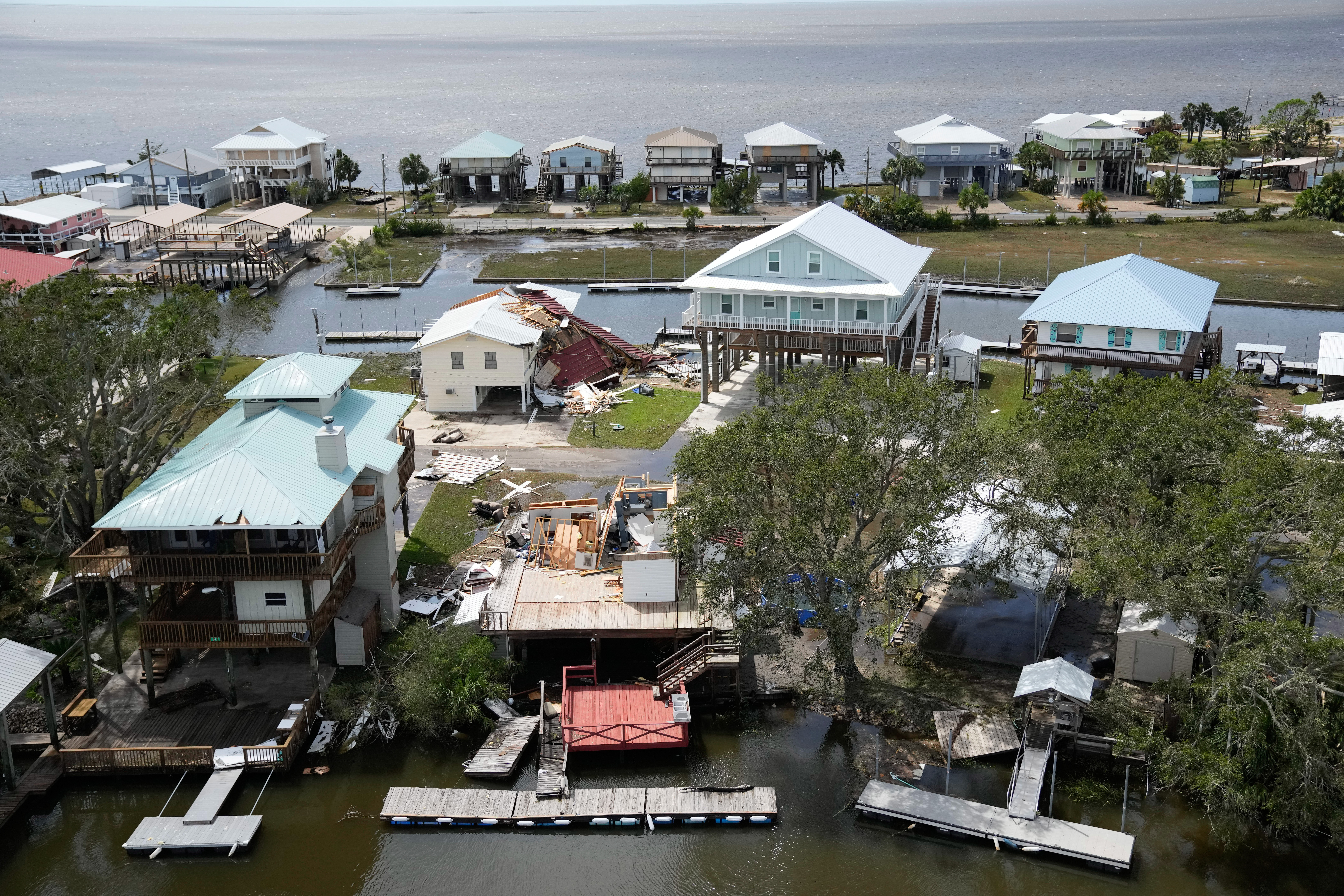 Several destroyed houses right along the coast