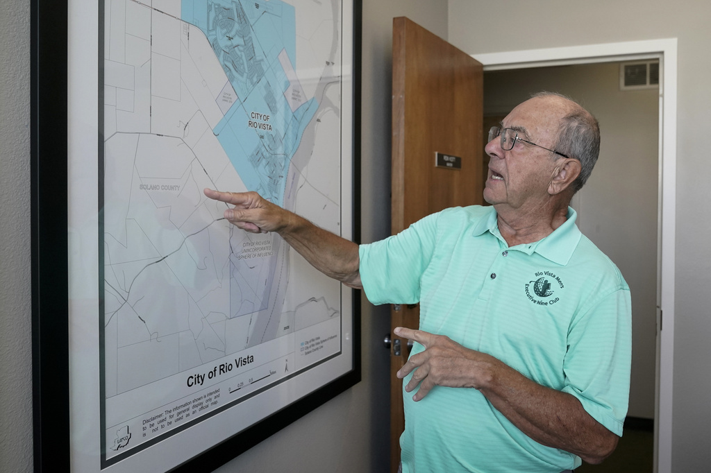 Mayor Ron Kott looks over a map of rural Solano County at City Hall in Rio Vista, Calif.