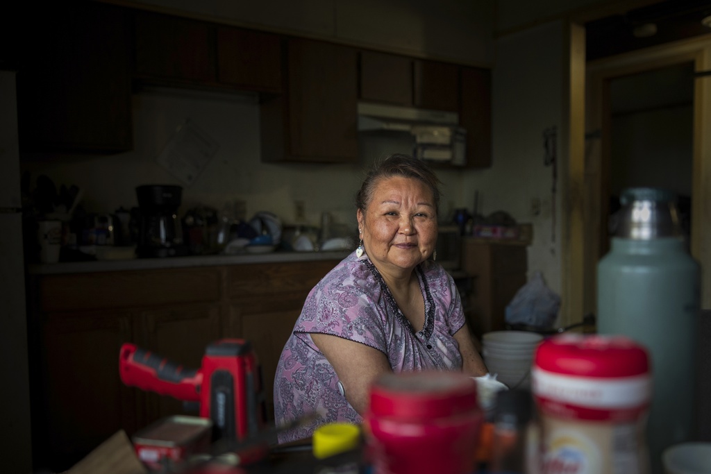 Vera Manutoli in Akiachak, Alaska. Vera originally obtained plumbing for her home in 2022, but resorted back to a bucket system after a pipe cracked during wintertime. The pipe has yet to be repaired.