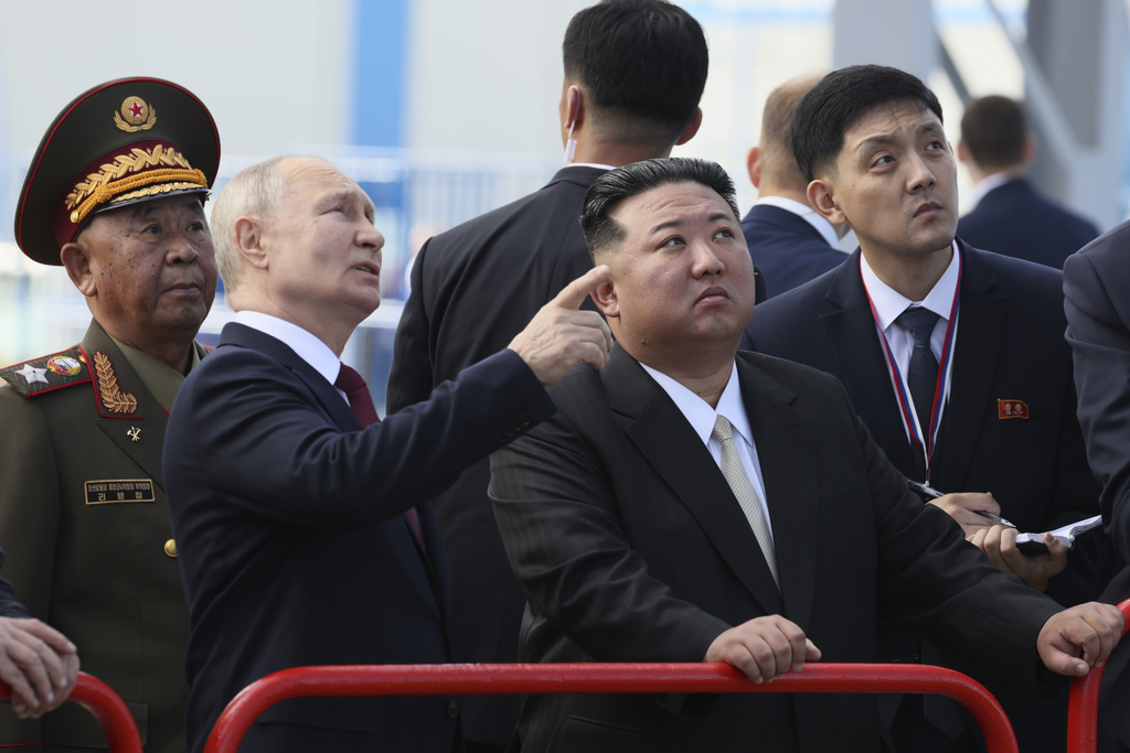 Russian President Vladimir Putin and North Korea