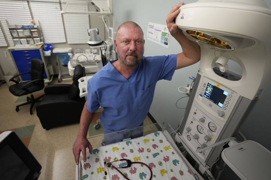 Dr. Eric Scott Palmer, a neonatologist, in the special care nursery at the Henry County Medical Center in Paris, Tenn. Palmer said that when the facility closes its maternity and special care facility, "There will be people hurt. It