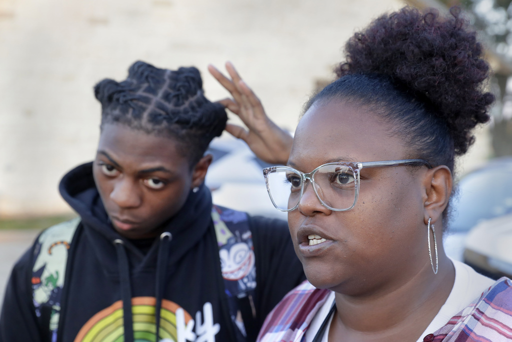 Darryl George, left, a 17-year-old junior, and his mother Darresha George